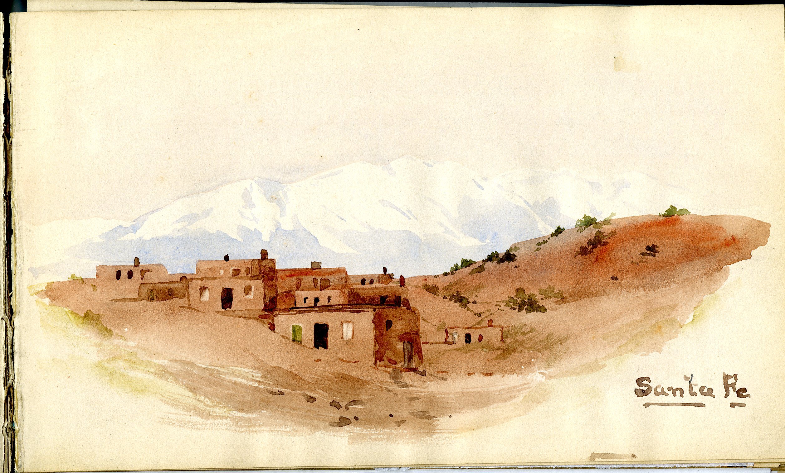 Landscape of Santa Fe with low adobe buildings, with white mountain range in background. In Mary King Longfellow's sketchbook (8dfa82ff-e7ab-4438-ad02-670dc7cdcf3f).jpg