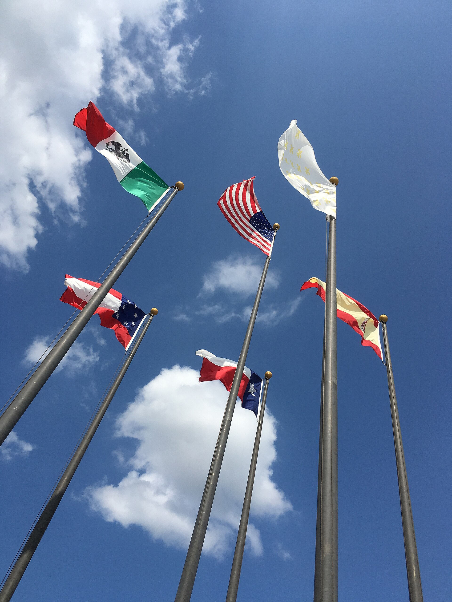 Six historical flags over texas.jpg